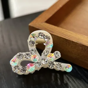 Pequeña pinza de pelo con diamantes de imitación brillantes, mini pinza acrílica blanca elegante.