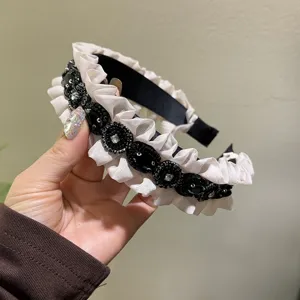 Exquisite rhinestone headband with ruffled edge, vintage sweet hair accessory for women.