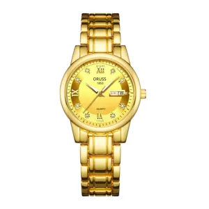 Orologio al quarzo da donna in oro con cinturino in acciaio e doppia visualizzazione data.