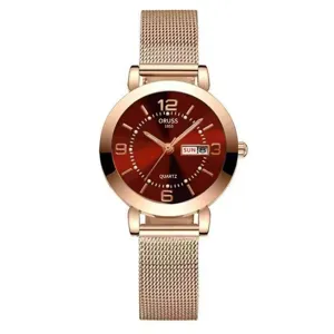 Detailed view of the luxury women quartz watch with red dial and rose gold mesh strap.