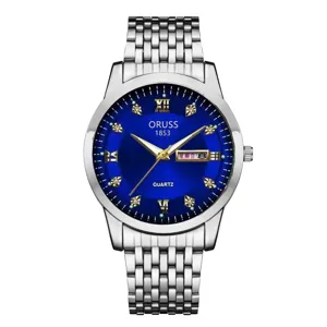 Men's quartz watch with blue dial silver stainless steel strap and calendar display detail view.