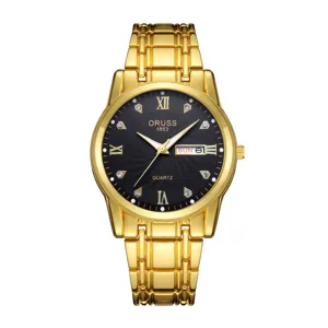 Gold tone quartz watch detail view, black dial with crystal markers and calendar display.