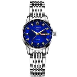 Elegante reloj de cuarzo para mujer con esfera azul, correa de acero y doble calendario útil.