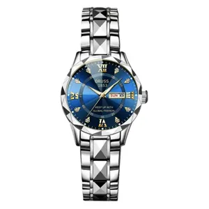 Detailed view of women's quartz watch with blue diamond-cut dial and geometric metal band.