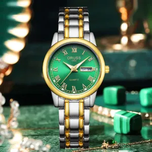 Élégante montre à quartz pour femme avec cadran vert, chiffres romains et beau bracelet.