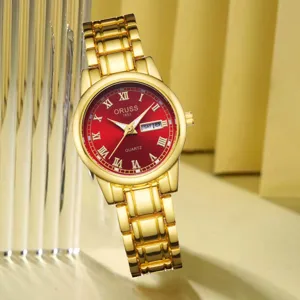 Montre quartz femme bracelet metal dore cadran rouge chiffres romains calendrier chic