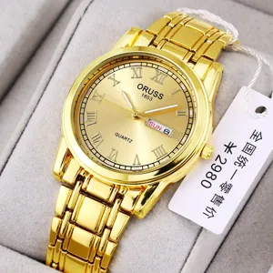 Golden quartz wristwatch for women and men with Roman numerals, calendar and metal strap.