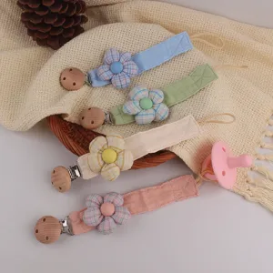 Handmade fabric flower baby pacifier clip strap toy anti-drop leash detail view infant accessory