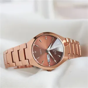 Men quartz wristwatch with stylish rose gold dial and metal bracelet, luxury business style.