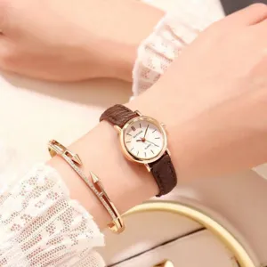 Women vintage small dial quartz watch with brown leather strap and elegant fashion bracelet.