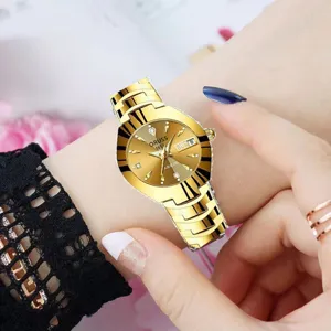 Elegant gold women's watch with stylish dial and metal strap for everyday fashion wear.