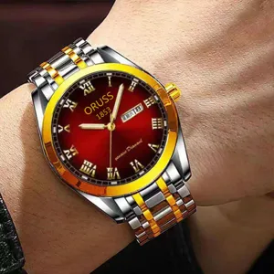 Reloj de cuarzo de lujo para hombre con brazalete de acero bicolor y esfera roja.