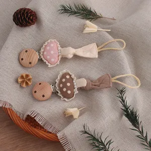 Forest style baby pacifier chain with cute mushroom design and wooden clip for teething toys.
