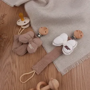 Baby Pacifier Clip Chain Fabric Bowknot Wooden Security Holder Strap Anti-Drop Teether Toy Traction Rope Embroidered Letter Ribbon Star Accessory For Infants Comfort