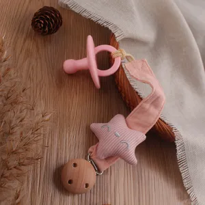Cute smiling star baby pacifier clip and silicone soother set for infant daily teething care.