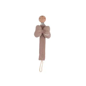 Baby pacifier clip with cute fabric bow design, safe wooden bead and durable strap for daily use.