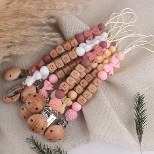 Cute wooden silicone baby pacifier clip teether chain set for infants safe toy holder.