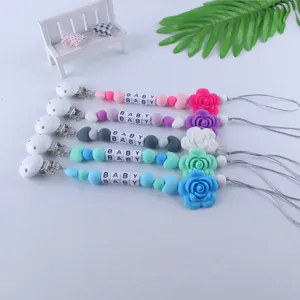 Clip para chupete de silicona con diseño de rosa y cuentas de bebé, soporte de mordedor seguro.