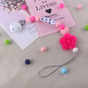Cadena de chupete para bebé de silicona con colgante de flor y abalorios de letras.