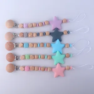 Wooden silicone star pacifier clips set for babies, teether toy holder safety chains.