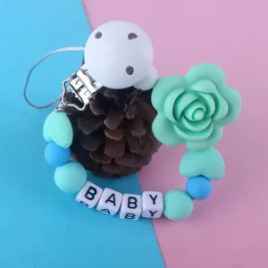 Cadena de chupete para bebé de silicona con flor menta y cuentas de letras para la seguridad infantil.