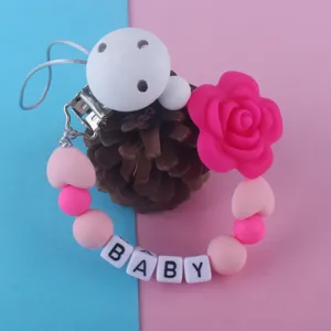 Cadena de chupete de silicona para bebe mordedor con cuentas y flor rosa metal clip.