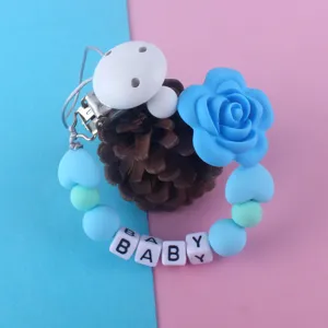 Cadena chupete de silicona mordedor para bebé, diseño de flor azul con letras.