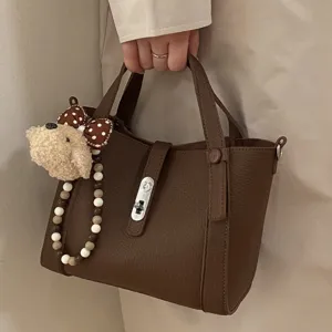 Dames Minimalistisch PU Leer Emmertas Casual Effen Kleur Handtas Retro Schoudertas met Slot Sluiting
