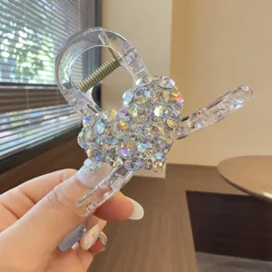 Clear rhinestone heart hair claw clip detail, sparkling crystal shark clip for elegant daily wear.