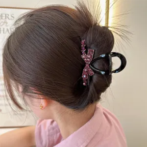 Pince à cheveux coréenne avec nœud et strass violets pour coiffures élégantes de femmes.