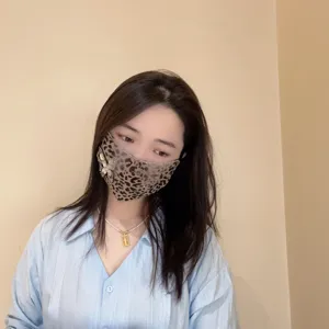 Stylish rhinestone leopard print face mask with crystal butterfly design for daily wear