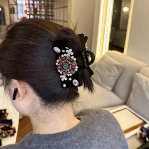 Schwarze Samt Schleife Haarklammer mit funkelnden Strasssteinen und Perlen für elegantes Haar.