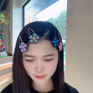 Pinces à cheveux en cristal pour femmes, élégants accessoires de coiffure tendance.