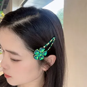 Pince à cheveux fleur en cristal vert, barrette strass scintillante pour frange élégante.