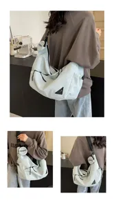 Casual large capacity canvas shoulder bag for women, stylish minimalist hobo crossbody bag.