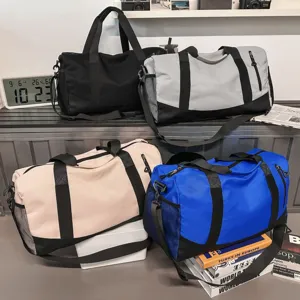 Large capacity casual duffel bag for travel, durable nylon shoulder crossbody bag for women.