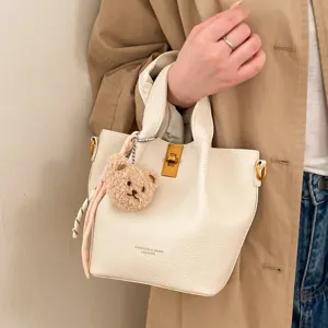 Women PU Leather Retro Bucket Bag Minimalist Solid Color Crossbody Bag With Cute Bear Pendant Fashion Handbag