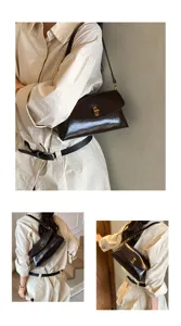 Women's vintage brown patent leather shoulder bag, chic commuter crossbody bag with lock.