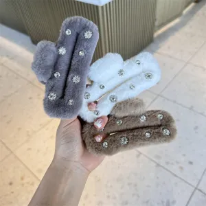 Plush rhinestone hair claw clip detail, fluffy winter hair accessory in multiple colors.
