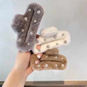 Fuzzy rhinestone hair claw clip set, plush square shark clip for chic hairstyles.