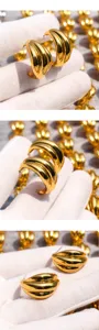 Gold wave geometric metal hoop earrings detail, stylish exaggerated chunky ear design for women.