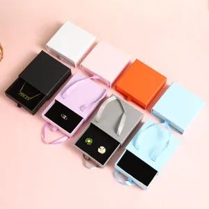 Scatola portagioie a cassetto con manico in nastro, scatole colorate per anelli, collane e orecchini.