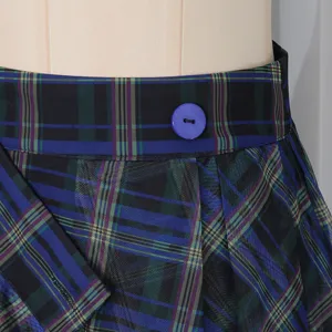 Blue plaid mesh skirt detail, high waist design with blue button and pleated tulle layers.