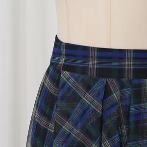Blue plaid high-waisted mesh skirt detail, showing delicate layered fabric and texture.