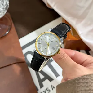 GEDI minimalist quartz watch featuring a genuine leather strap and practical calendar display.