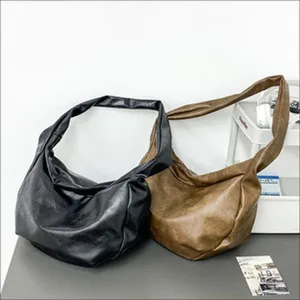 Soft leather slouchy hobo bag, large capacity casual daily tote bag in black and brown.
