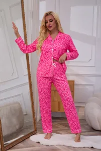 Pink leopard print long sleeve button-up pajama set detail view for comfortable sleepwear.