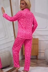 Pink leopard print long sleeve pajama set detail shot showing lapel cardigan top and pants.