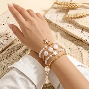 Detailed shot of multi-layer summer beach pearl starfish and shell bracelet set, elegant.
