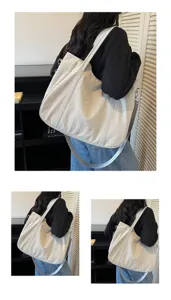Large capacity canvas tote bag for women, casual shoulder bag with wide strap style.